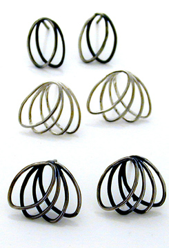 3 pairs of ellipse studs: loops, and fans, plain and oxidised