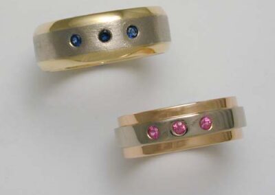 Coloured 18ct rings with pink and blue sapphires