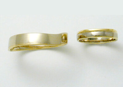 Pair 18 carat White and Yellow Gold Shaped Rings