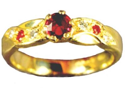 Ruby and diamond 18 carat gold ring